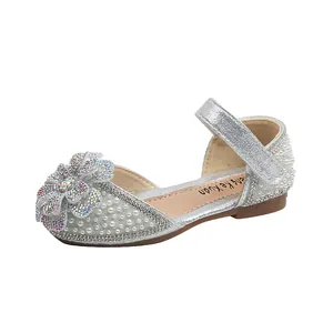 Sparkling silver girls' princess shoes with rhinestone flower detail and pearl beads