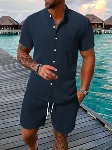 Men's navy blue 2-piece summer set with textured short sleeve shirt and shorts.