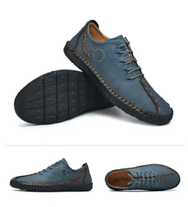 Detailed view of handmade men's leather loafers with intricate stitching and durable soles