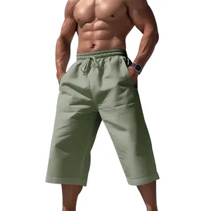 Pantalon court décontracté pour homme, vert, respirant, avec taille élastique à cordon.