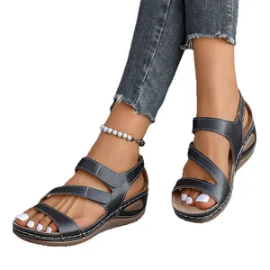 Comfortable black women's wedge sandals featuring open-toe design and hook-and-loop closure