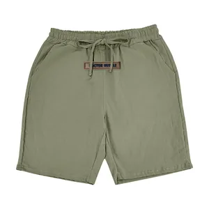 Detailed view of olive green men's summer breathable linen casual shorts with drawstring