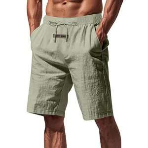 Close-up of lightweight breathable linen shorts with drawstring and patch detail.
