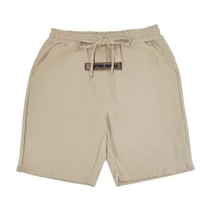 Men's khaki breathable linen casual shorts with elastic drawstring waist and patch detail
