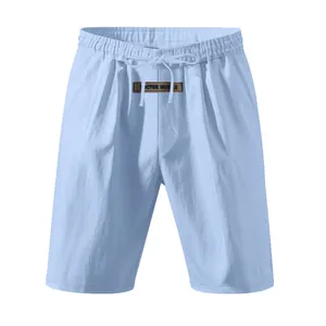 Macro detail of light blue breathable linen shorts for men with adjustable drawstring