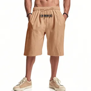Front view detail of breathable tan linen men's summer shorts with drawstring waist