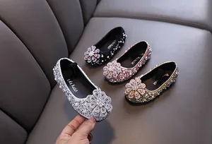 Elegant girls princess flat shoes featuring sparkling rhinestones and pearl flower accents