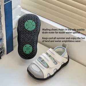 Detail of non-slip sole with drainage holes on quick-dry children's water shoes.