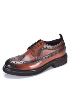 Classic men's brown genuine leather brogue shoes with wingtip detail and thick sole