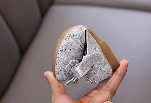 Flexible silver rhinestone princess shoe for toddler girls showing soft sole