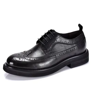 Classic men's black leather wingtip brogue dress shoes with thick platform sole