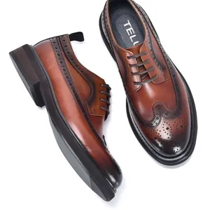 Classic brown leather Brogue shoes for men with wingtip carving and a thick sole