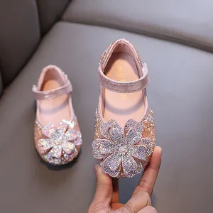 Elegant pink princess shoes for girls featuring sparkling rhinestones and crystal flower