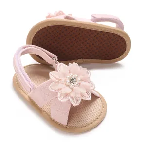 Cute pink baby girl princess sandals with decorative lace flower and soft non-slip sole