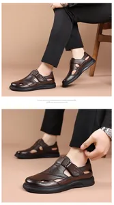 Detailed view of men's brown genuine leather cutout sandals with non-slip soles