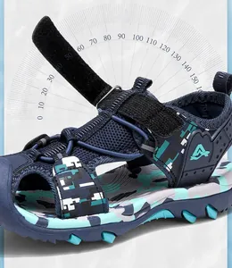 Close-up detail of boys' blue camouflage sport sandal with adjustable velcro strap