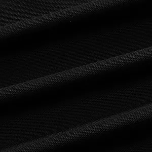 Macro view of breathable black mesh fabric for men's quick-dry golf polo shirt.