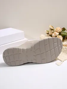 Detail view of the durable anti-slip sole on women's casual platform summer slippers