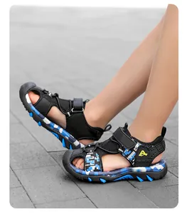 Close-up of boys' blue camouflage sports sandals with closed-toe design