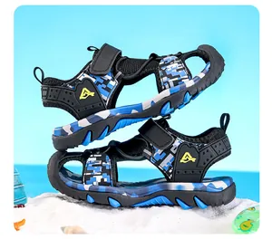 Side view of blue camouflage boys' sports sandals with protective closed toe and soft sole.
