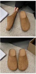 Detailed close-up view of camel suede closed-toe mules with comfortable thick soles