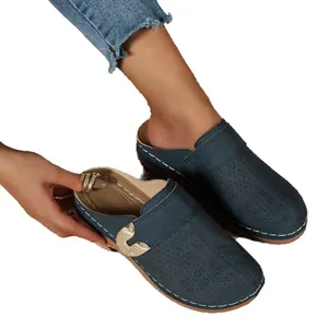 Stylish blue women's clogs with metallic heart buckle and hollow-out floral pattern