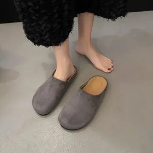Chic grey suede closed-toe mules for women with thick soles and slip-on design