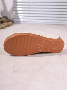 Detailed macro view of comfortable anti-slip rubber sole for women's wedge slippers in size 37