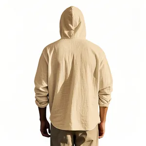 Back view of a men's beige bohemian cotton linen hooded long-sleeve casual shirt.