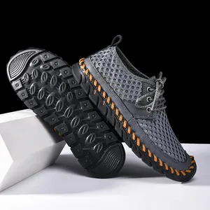 Detailed view of men's mesh water shoes showing the anti-slip sole and hand-stitching
