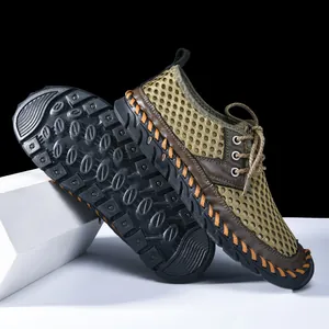 Close-up of breathable mesh upper and non-slip rubber outsole on outdoor water shoes