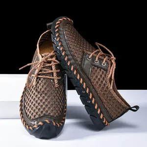 Close-up of hand-stitched mesh outdoor wading shoes with durable non-slip rubber soles