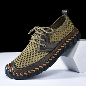 Breathable men's mesh wading shoes featuring manual stitching and anti-slip rubber soles