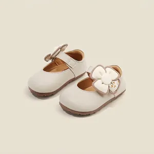 Elegant beige baby girl princess shoes with 3D floral accent and adjustable velcro strap