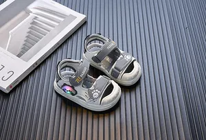 Detail of toddler light-up sandals featuring a cute panda design and soft sole