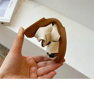 Flexible soft sole of girls closed-toe sandals demonstrating comfort and ease of movement