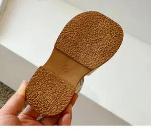 Detail of textured anti-slip rubber sole for toddler girls sandals with size 23 mark