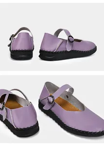 Detailansicht der lila Vintage Mary Jane Flachschuhe mit Schnalle und Flechtsohle.
