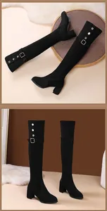 Stylish black over-the-knee suede boots featuring block heels and metallic buckle details.