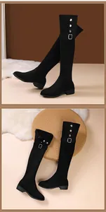 Detailed view of black suede over-the-knee stretch boots with decorative buckles