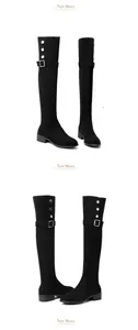 Detailed view of black suede over-the-knee boots with stylish metal buckle accents
