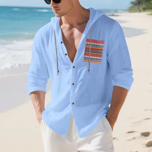 Detail view of a men's light blue hooded linen shirt with bohemian pattern pocket design.