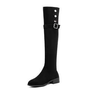 Elegant black over-the-knee stretch suede boots featuring silver buckle and stud details