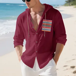 Men's bohemian burgundy linen hooded shirt with colorful patterned pocket on beach