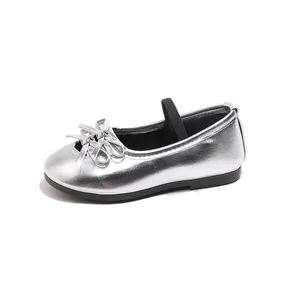 Elegant silver girls ballet flats with decorative bow and elastic strap for dance
