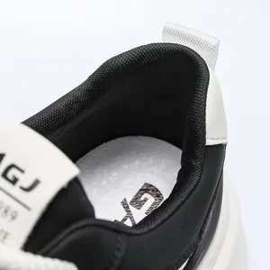 Close-up detail of the breathable mesh lining and premium leather heel on men's chunky sneakers.