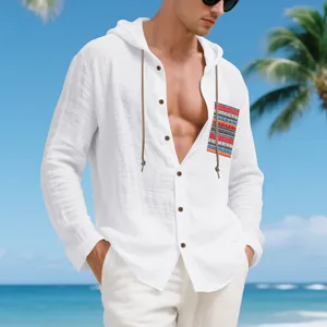 Men's white linen bohemian hoodie shirt with patterned pocket on beach background