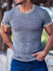 Close-up of men's athletic T-shirt showing ribbed texture and striped collar detail