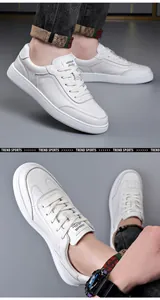 Détail macro de baskets blanches pour hommes en cuir véritable, texture souple et style