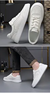 Vue détaillée des baskets en cuir grainé blanc pour hommes montrant la texture et le rendu